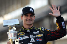 Jeff Gordon, driver of the #24 Axalta Chevrolet, celebrates with the trophy after winning the NASCAR Sprint Cup Series Crown Royal