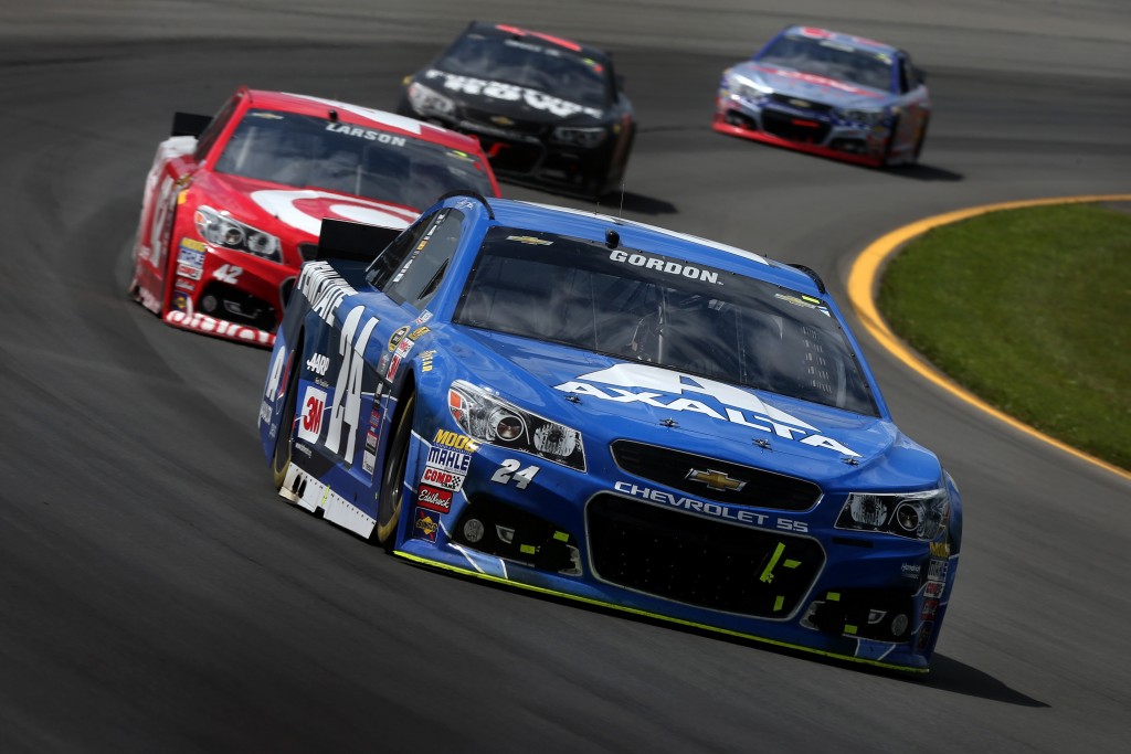 LONG POND, PA - JUNE 07: Jeff Gordon, driver of the #24 Axalta/Penn State Chevrolet, leads a pack of cars during the NASCAR Sprint Cup Series Axalta 'We Paint Winners' 400 at Pocono Raceway on June 7, 2015 in Long Pond, Pennsylvania. (Photo by Nick Laham/Getty Images)