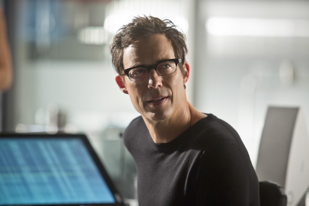 The Flash -- "Flash vs. Arrow" -- Image FLA108a_0311b -- Pictured: Tom Cavanagh as Dr. Harrison Wells -- Photo: Katie Yu/The CW -- ÃÂ© 2014 The CW Network, LLC. All rights reserved.