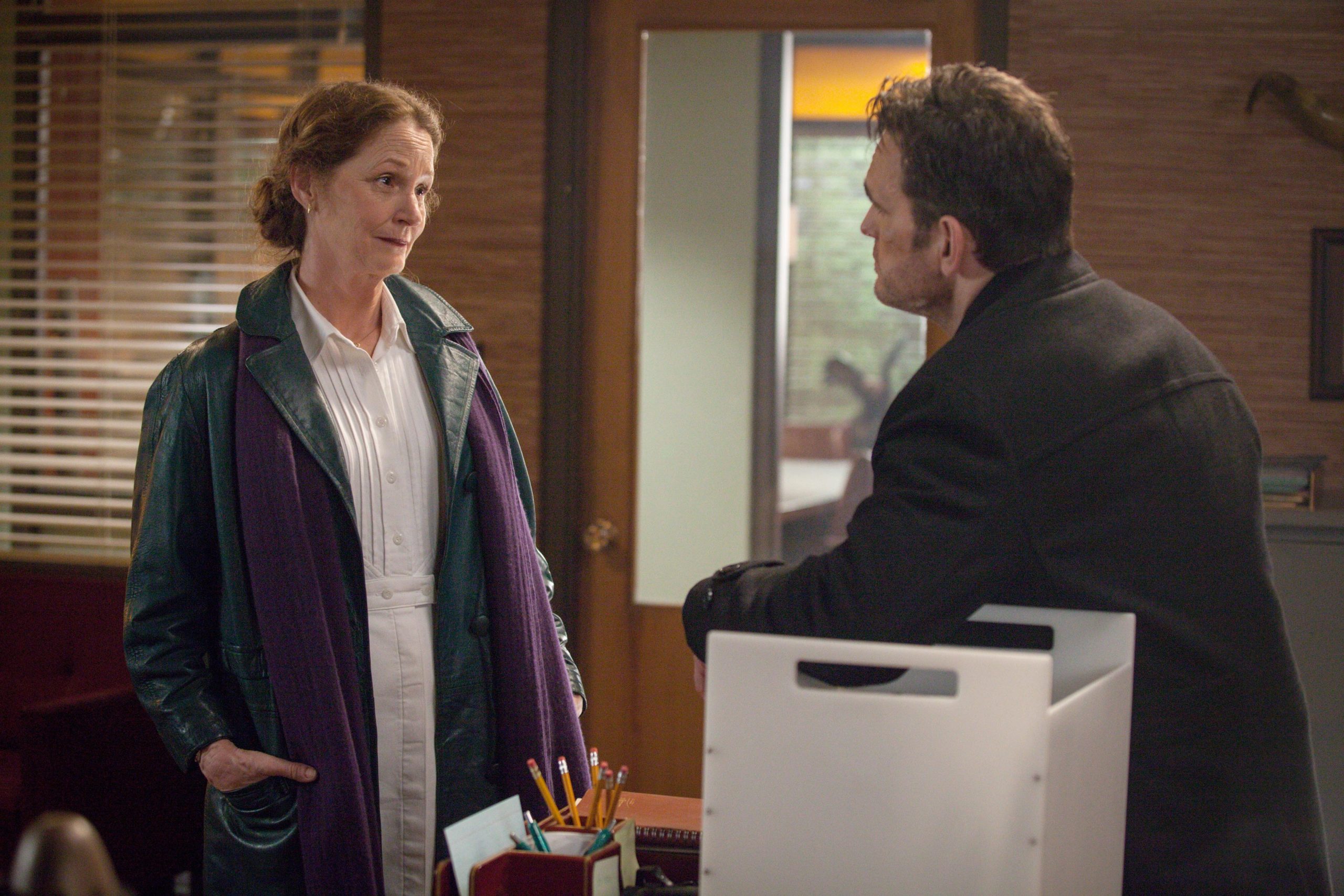 Pam (Melissa Leo) comes to offer Ethan (Matt Dillon) in Wayward Pines