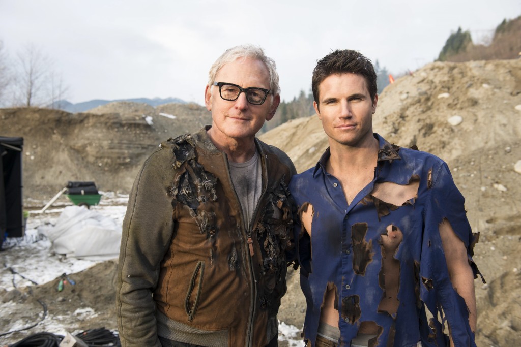 Victor Garber and Robbie Amell pose at the quarry near Vancouver where they shot Firestorm’s nuclear separation for The Flash