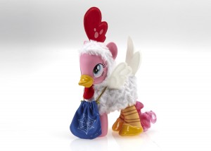 MY LITTLE PONY Pinkie Pie "Chicken" Figure (Ages 3 years & up/Approx. Retail Price: $49.99/Available through HasbroToyShop.com or Booth #3213 at Comic-Con International in San Diego) Get ready for all of the fun, thrills, and chills of Nightmare Night with the MY LITTLE PONY Pinkie Pie "Chicken" Figure! This adorable pony, inspired by the silly, fan favorite outfit PINKIE PIE donned in the "Luna Eclipsed" MY LITTLE PONY: FRIENDSHIP IS MAGIC episode, is never too old for candy, costumes and spooky adventures. She comes dressed and ready for Nightmare Night fun, wearing a fluffy chicken outfit accessorized with a gold colored beak and a treat bag. The Pinkie Pie pony figure will be for sale at Comic-Con 2015! Following the convention, a limited number will be available on HasbroToyShop.com. 