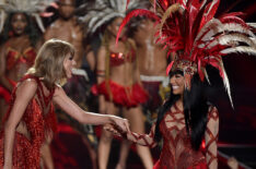 Taylor Swift and Nicki Minaj perform onstage during the 2015 MTV Video Music Awards