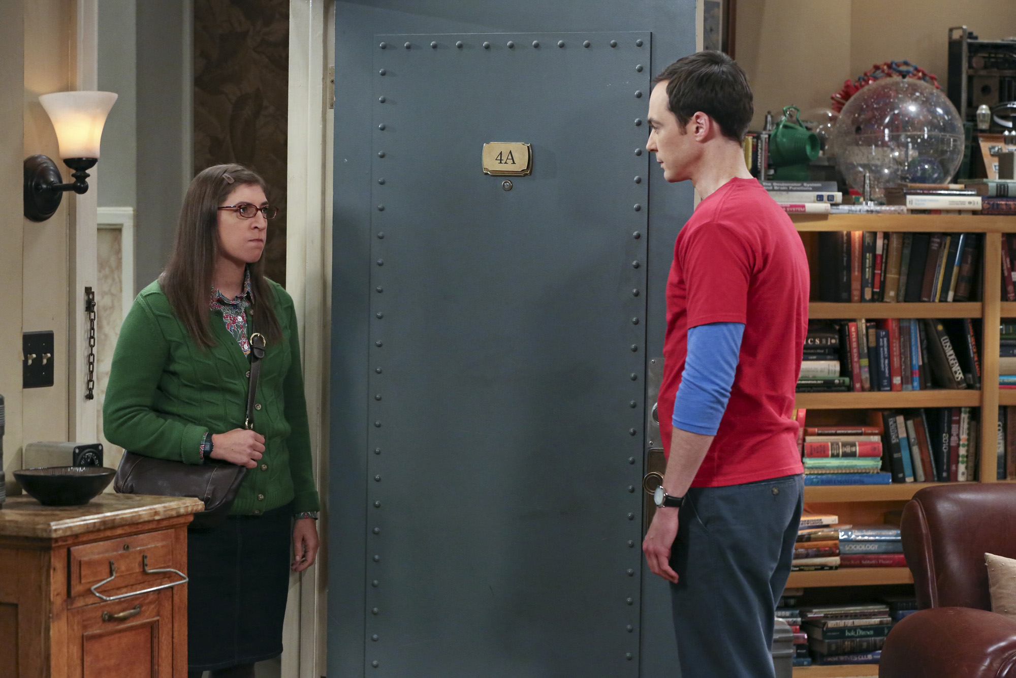 The Separation Oscillation" -- Sheldon (Jim Parsons, right) films a special episode of "Fun with Flags" after his breakup with Amy (Mayim Bialik, left), on THE BIG BANG THEORY, Monday, Sept. 28 (8:00-8:31 PM, ET/PT), on the CBS Television Network. Photo: Michael Yarish/Warner Bros. Entertainment Inc. © 2015 WBEI. All rights reserved.