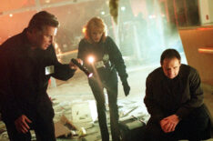 William Petersen, Marg Helgenberger, and Paul Guilfoyle investigate a bombing in CSI: Crime Scene Investigation