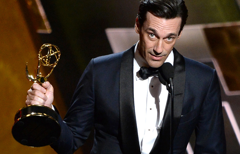 Jon Hamm accepts an award onstage during the 67th Annual Primetime Emmy Awards