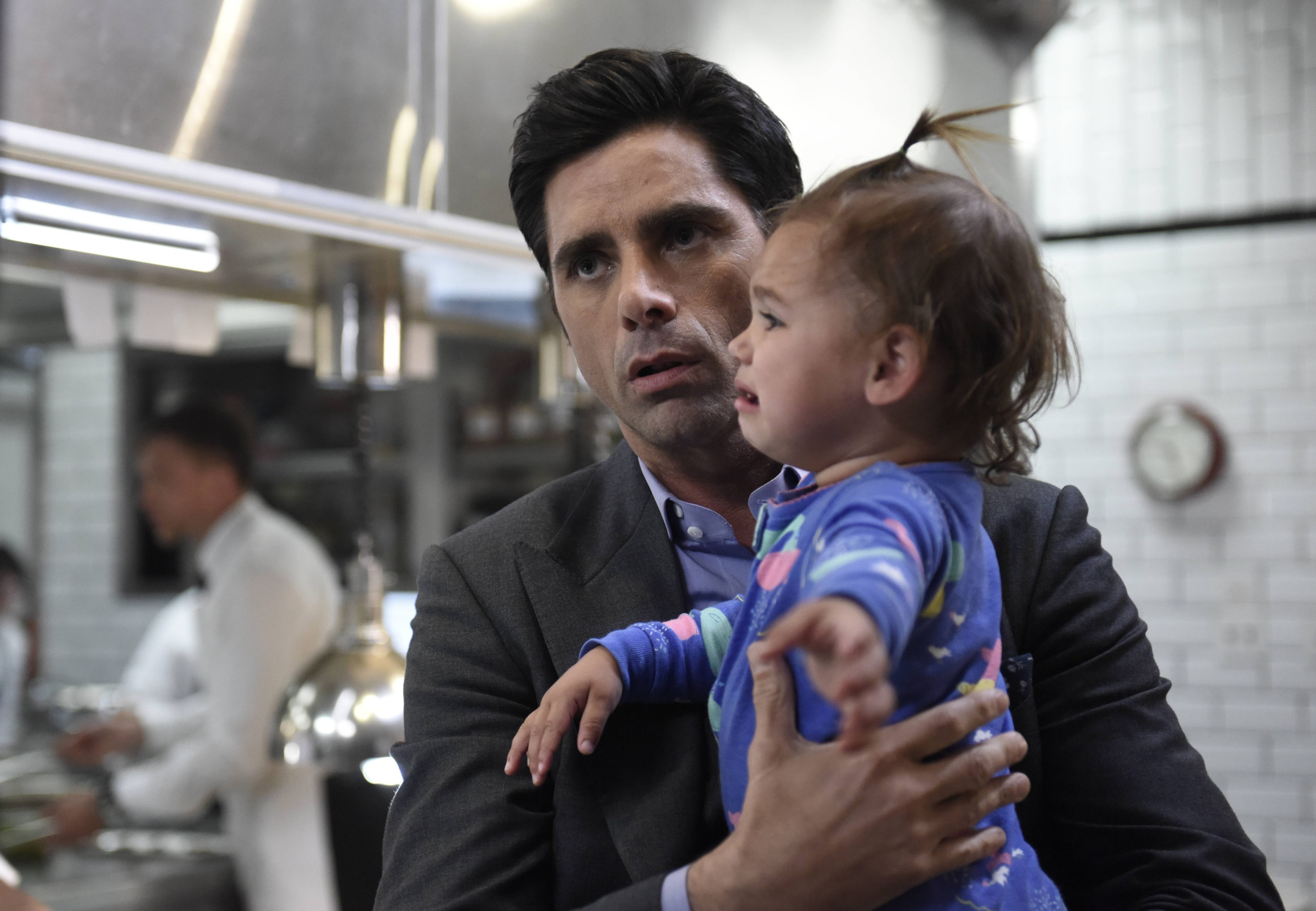 John Stamos as Jimmy with Edie in Grandfathered