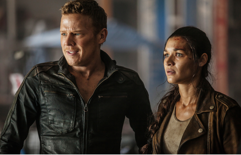 Chris Egan as Alex, Kim Engelbrecht as Sergeant Noma Walker in Dominion - 'The Longest Mile Home'