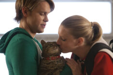 Chord Overstreet as Sam with Heather Morris as Brittany kissing Lord Tubbington on FOX's Glee, Season 4