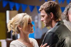 Emily Rose as Audrey Parker and Lucas Bryant as Nathan Wuornos in Haven