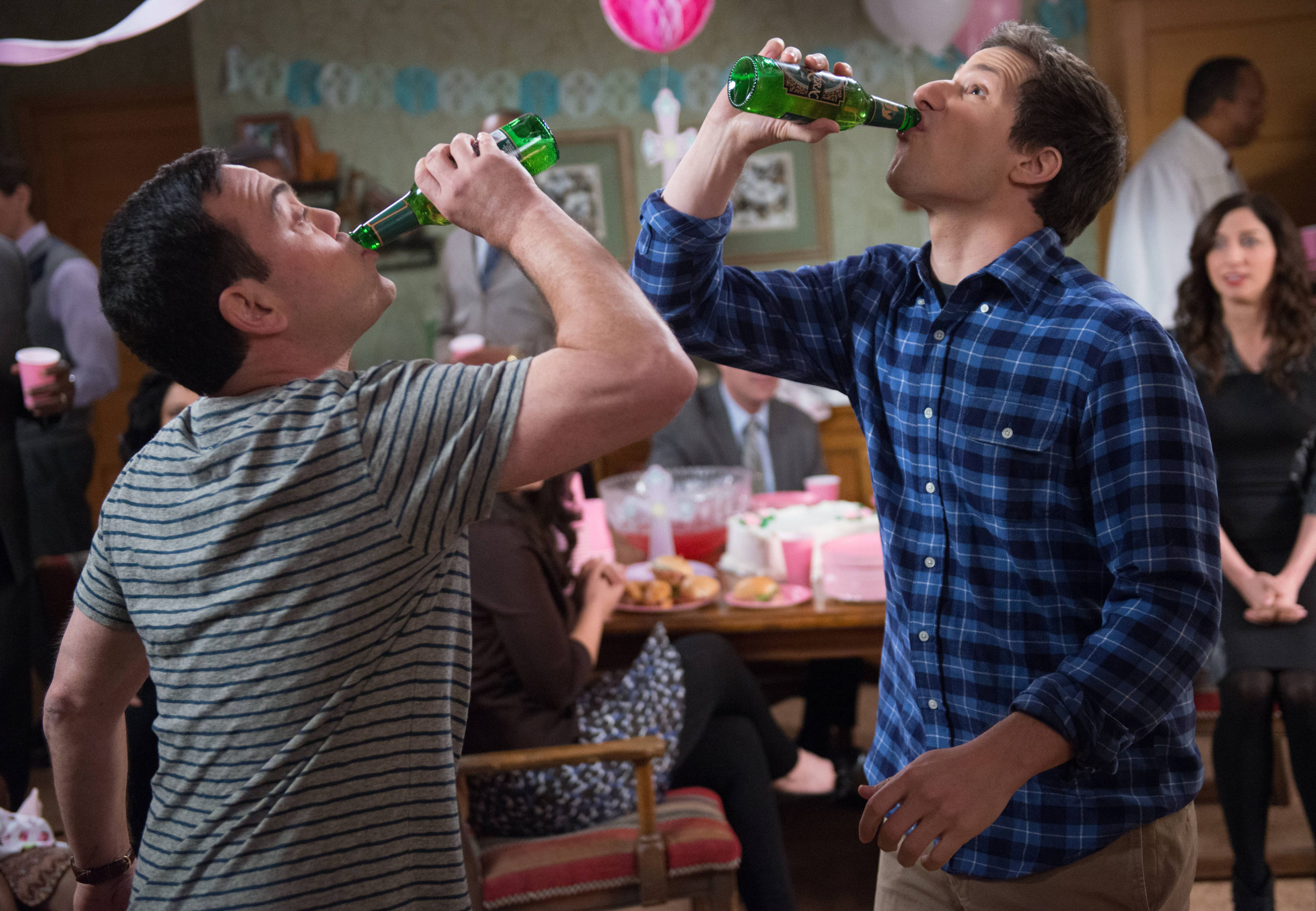 Charles Boyle (Joe Lo Truglio) and Det. Jake Peralta (Andy Samberg) have a friendly competition in the 'The Party' Time Period Premiere episode of Brooklyn Nine-Nine