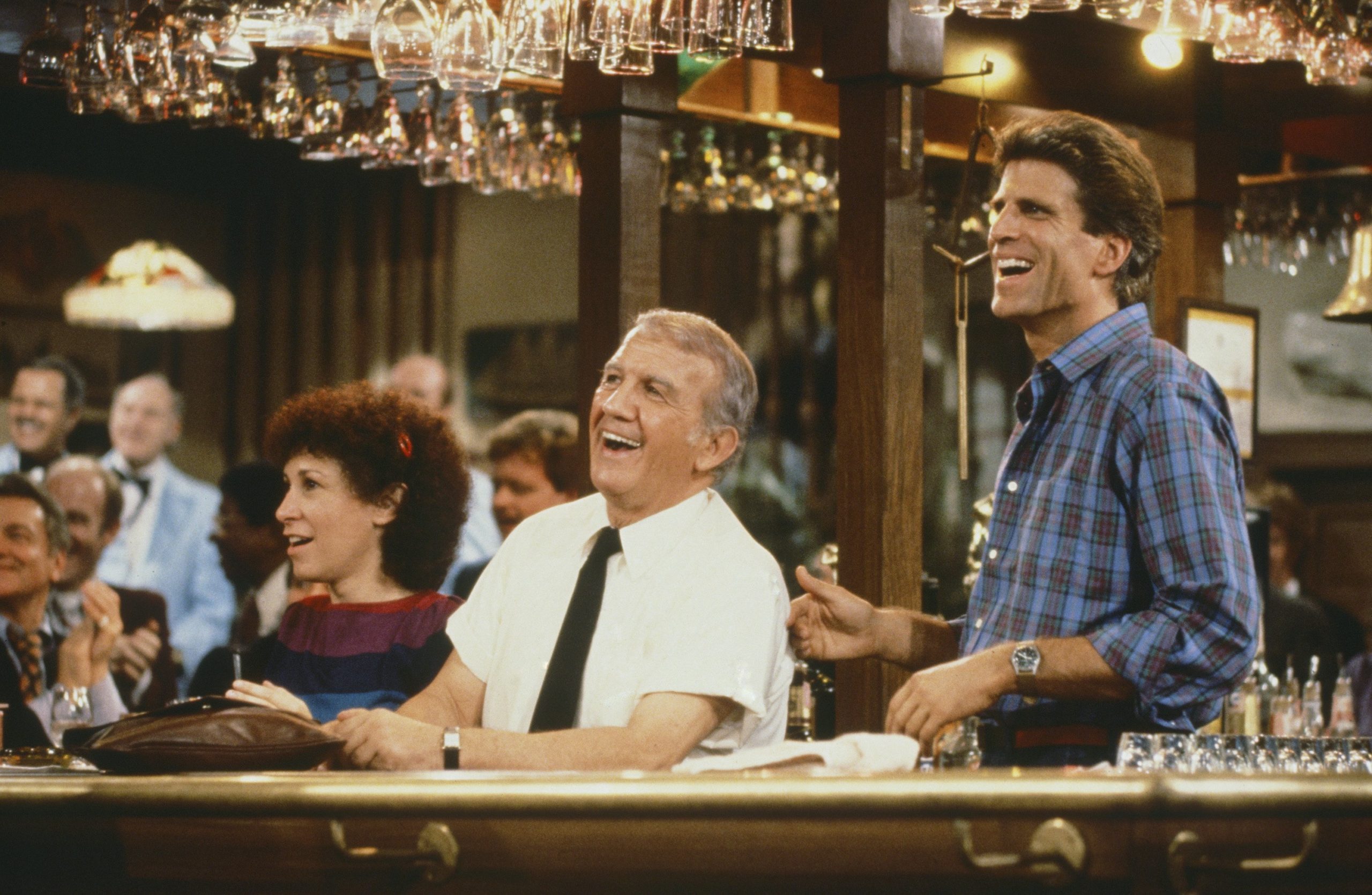 Cheers - Rhea Perlman as Carla Tortelli, Nicholas Colasanto as Ernie 'Coach' Pantusso, Ted Danson as Sam Malone