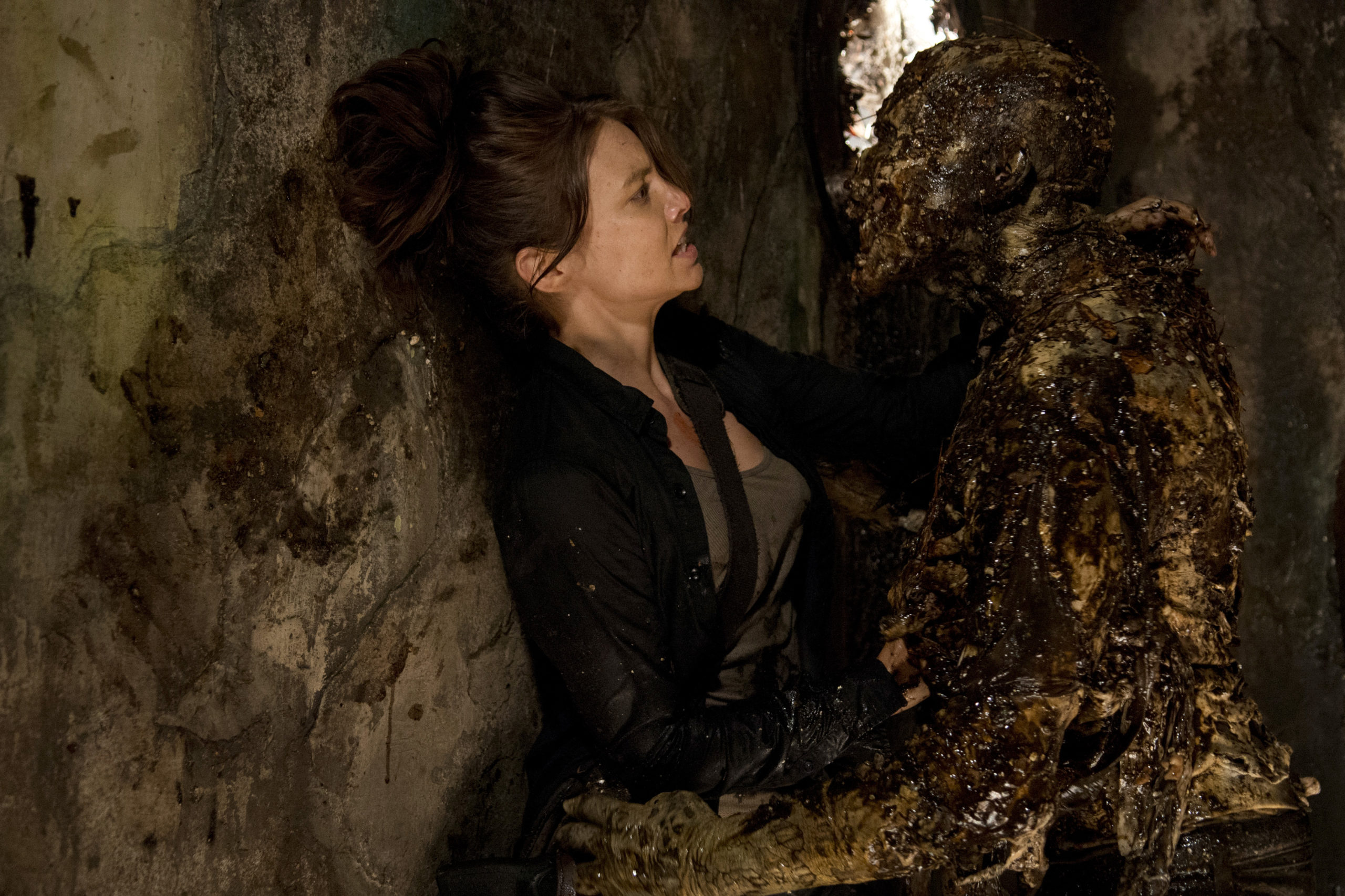 Maggie and sewer zombie on The Walking Dead