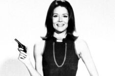 Diana Rigg as Emma Peel of The Avengers poses with gun