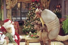 Cole Mitchell Sprouse as Ben Geller, Matthew Perry as Chandler Bing as 'Santa Claus', David Schwimmer as Ross Geller as 'The Holiday Armadillo in Friends