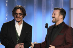 Presenter Johnny Depp, Host Ricky Gervais on stage during the 69th Annual Golden Globe Awards in 2012