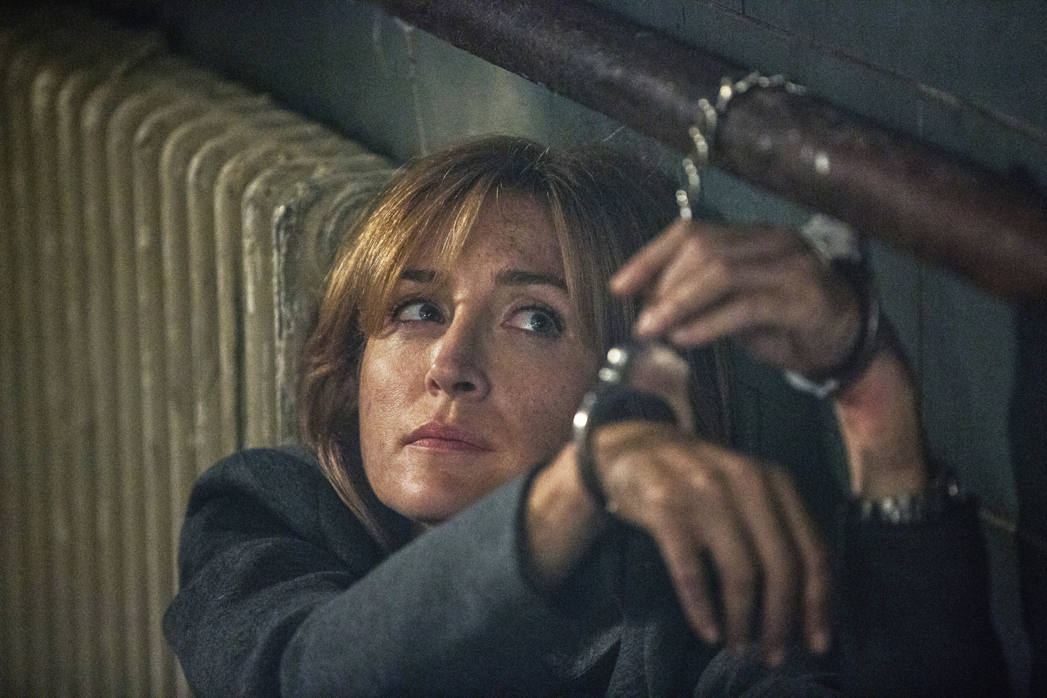 Sasha Alexander chained with handcuffs in Rizzoli & Isles