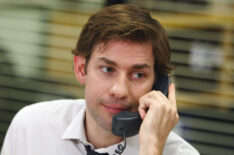 John Krasinski as Jim Halpert answering the phone on The Office