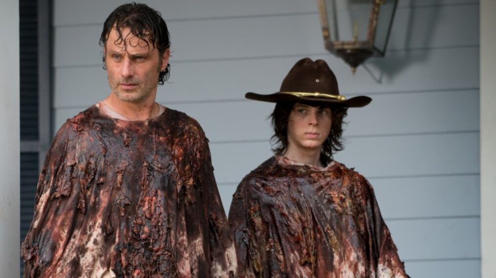 Andrew Lincoln as Rick Grimes and Chandler Riggs as Carl Grimes in The Walking Dead - Season 6, Episode 8