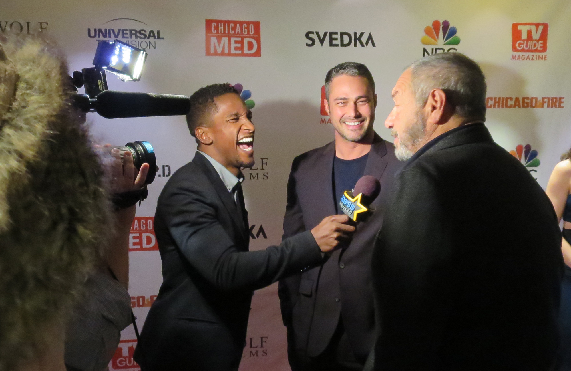 Access Hollywood's Scott Evans, Taylor Kinney, Dick Wolf