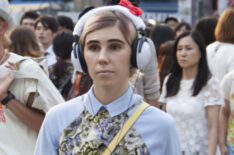 Zosia Mamet walking through Tokyo in Girls