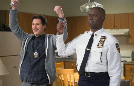 Det. Jake Peralta (Andy Samberg) handcuffs himself to Capt. Ray Holt (Andre Braugher) in the 'Christmas' episode of Brooklyn Nine-Nine