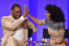 Anthony Anderson and Tracee Ellis Ross of Black-ish high-fiving at PaleyFest LA 2016