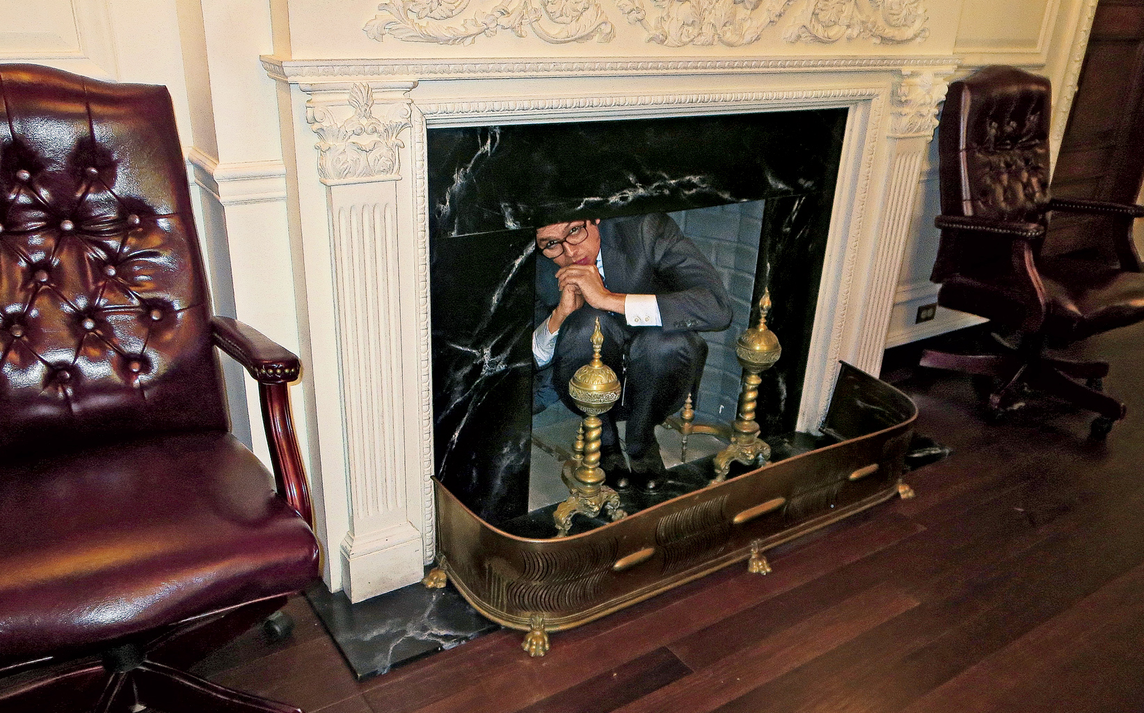 Geoffrey Arend as Matt Mahoney hiding in a fireplace in Madam Secretary