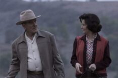 Bryan Cranston and Melissa Leo as LBJ and Ladybird Johnson walking their beagles in All The Way