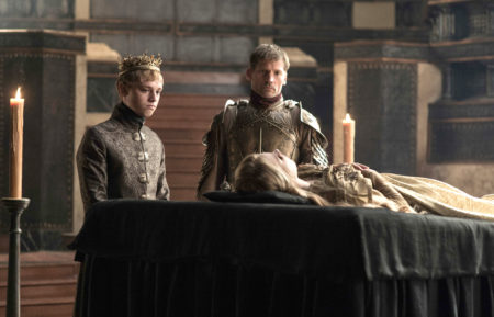 Dean-Charles Chapman as King Tommen Baratheon and Nikolaj Coster-Waldau as Jaime Lannister in Game of Thrones