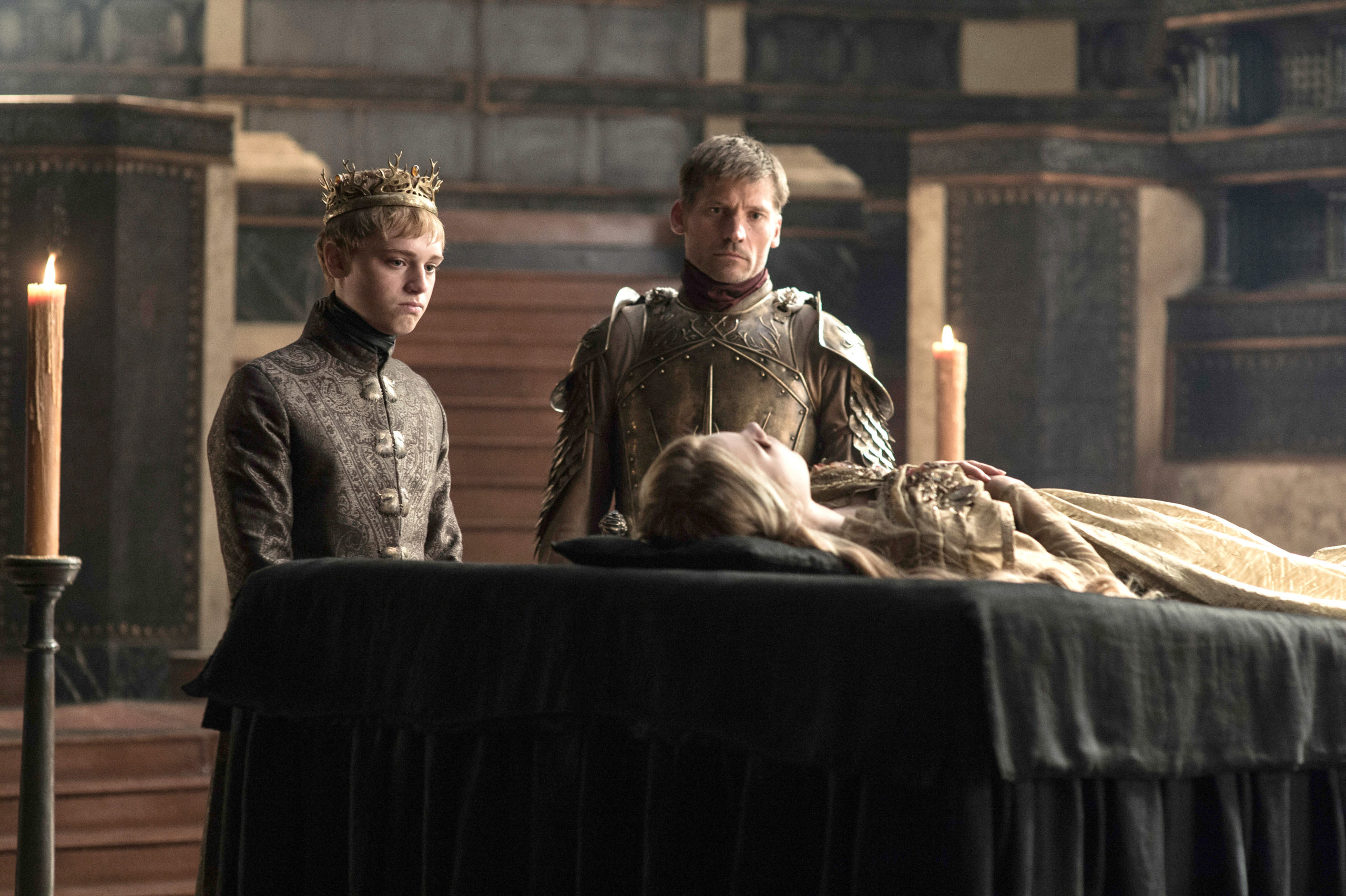 Dean-Charles Chapman as King Tommen Baratheon and Nikolaj Coster-Waldau as Jaime Lannister in Game of Thrones