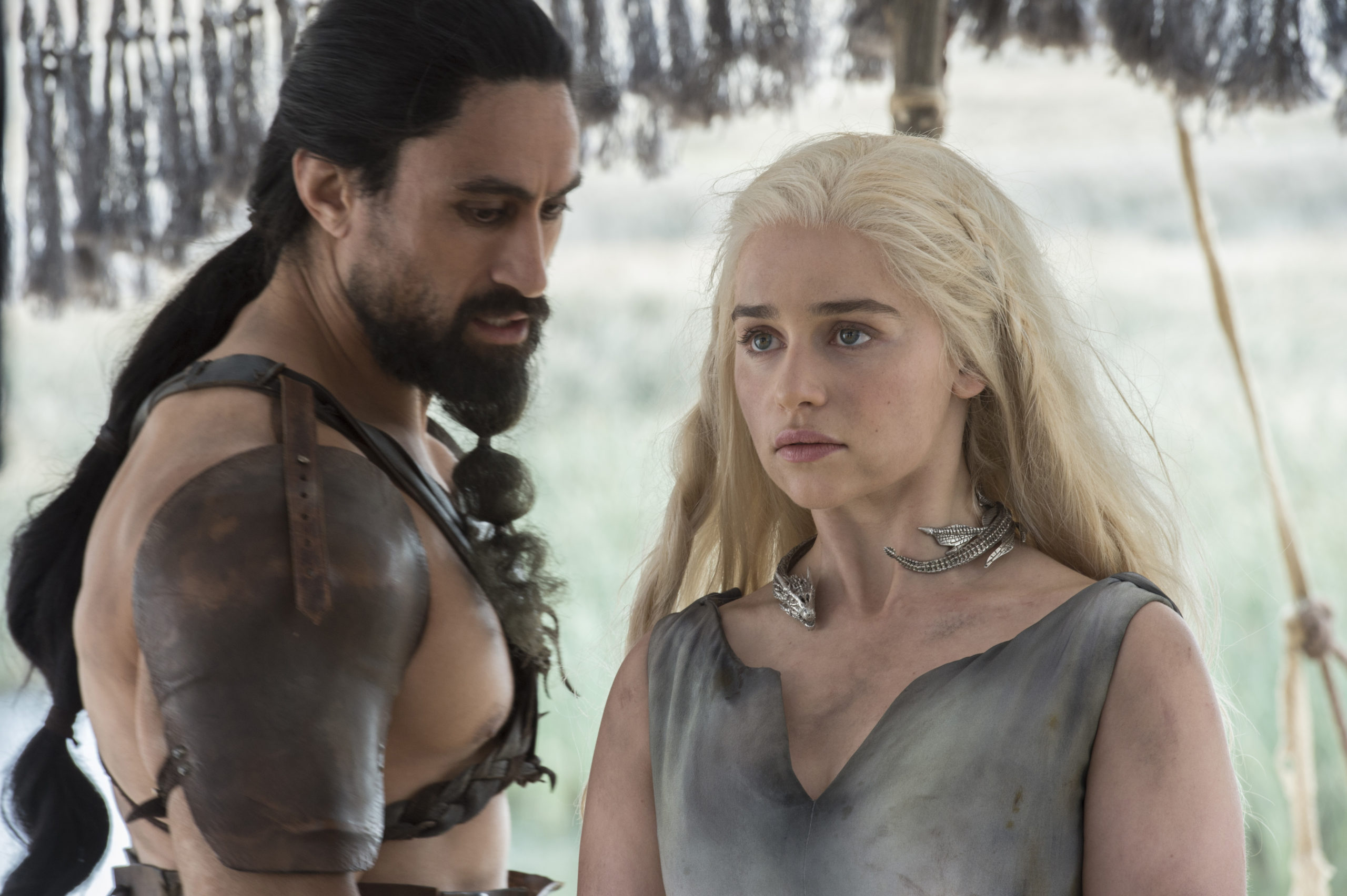 Joe Naufahu and Emilia Clarke in Game of Thrones