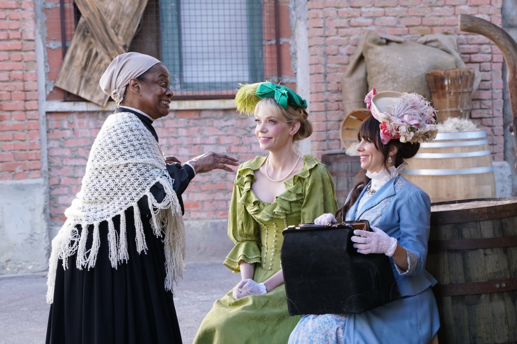 Bebe Drake as Harriet Tubman, talking "branding" with the girls.