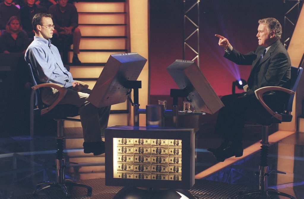 Regis Philbin (right) with John Carpenter, the first million-dollar winner on the American version of Who Wants to be a Millionaire? in 1999.