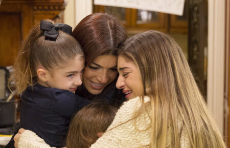 Teresa Giudice hugs her daughters after being released from federal prison on The Real Housewives of New Jersey - Season 7