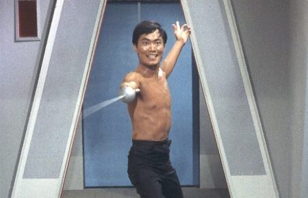 George Takei shirtless and fencing in Star Trek