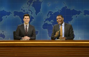 ATURDAY NIGHT LIVE -- "Woody Harrelson" Episode 1668 -- Pictured: (l-r) Colin Jost and Michael Che during Weekend Update on November 15, 2014 -- (Photo by: Dana Edelson/NBC/NBCU Photo Bank via Getty Images)