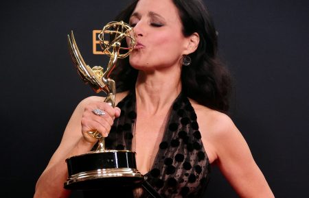 Julia Louis-Dreyfus poses in the press room with the Emmy for Outstanding Lead Actress in a Comedy Series for 'Veep' during the 68th Emmy Awards