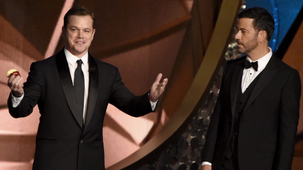 Matt Damon and host Jimmy Kimmel speak onstage during the 68th Emmy Awards show on September 18, 2016