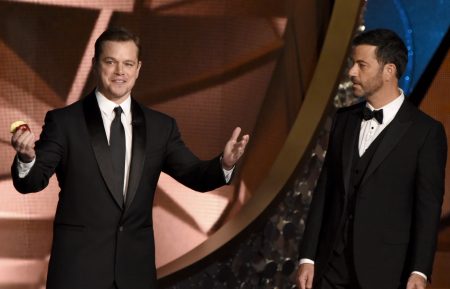 Matt Damon and host Jimmy Kimmel speak onstage during the 68th Emmy Awards show on September 18, 2016