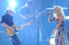 Brad Paisley and Carrie Underwood perform onstage at the 45th annual CMA Awards