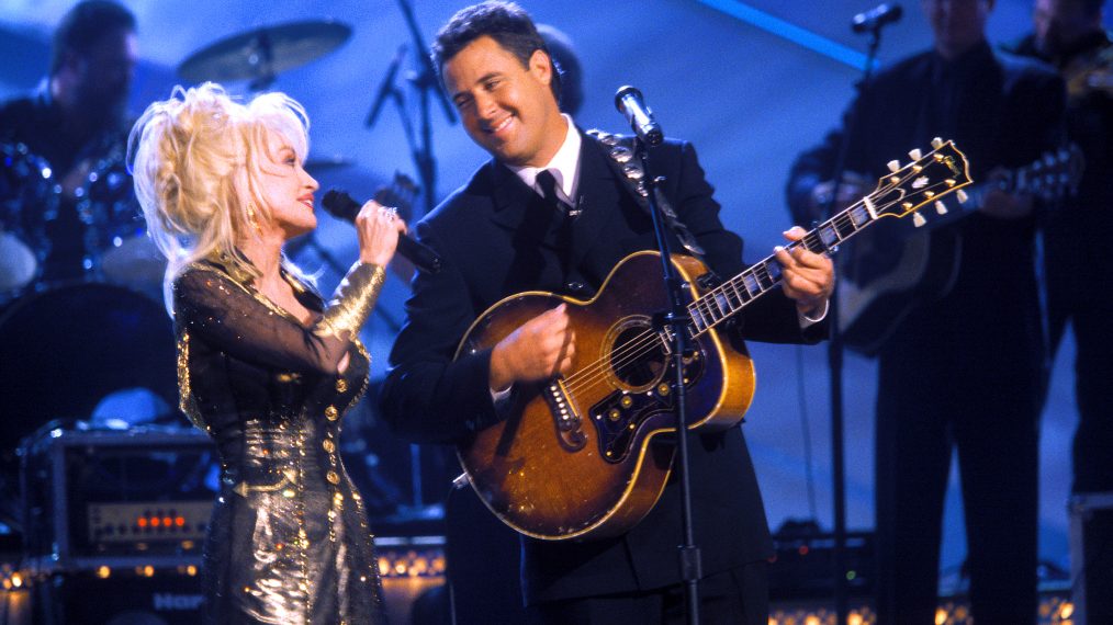 Dolly Parton and Vince Gill perform at The 33th Annual CMA Awards in 1999