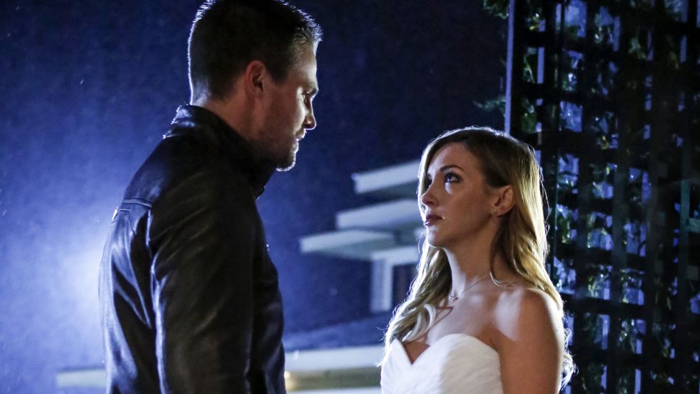 Arrow - Stephen Amell as Oliver Queen and Katie Cassidy as Laurel Lance