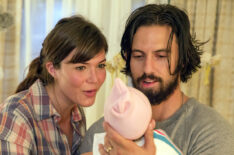 Mandy Moore as Rebecca and Milo Ventimiglia as Jack holding a baby in This is Us - 'Kyle'