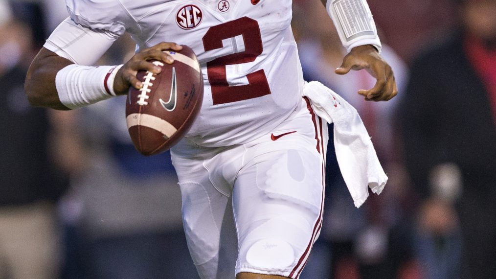 Jalen Hurts #2 of the Alabama Crimson Tide rolls out to pass during a game against the Arkansas Razorbacks at Razorback Stadium on October 8, 2016 in Fayetteville, Arkansas