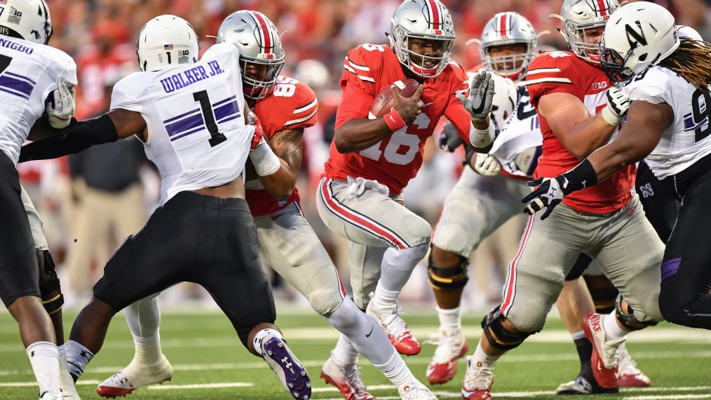 COLUMBUS, OH - OCTOBER 29: Quarterback J.T. Barrett #16 of the Ohio State Buckeyes runs with the ball against the Northwestern Wildcats at Ohio Stadium on October 29, 2016 in Columbus, Ohio. (Photo by Jamie Sabau/Getty Images)