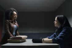 Simone Missick as Misty Knight interrogates Krysten Ritter's Jessica Jones in 'Marvel's The Defenders'