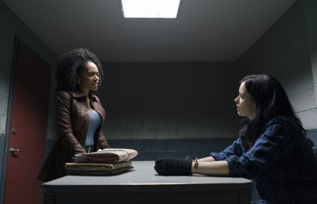 Simone Missick as Misty Knight interrogates Krysten Ritter's Jessica Jones in 'Marvel's The Defenders'