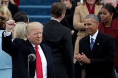 President Donald Trump raises a fist after his inauguration as former President Barack Obama applauds on the West Front of the U.S. Capitol on January 20, 2017 in Washington, DC