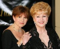 Actress Carrie Fisher and her mother, actress Debbie Reynolds, arrive for Dame Elizabeth Taylor's 75th birthday party at the Ritz-Carlton, Lake Las Vegas